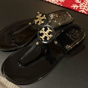 Tory Burch Black Sandals with Gold Emblem